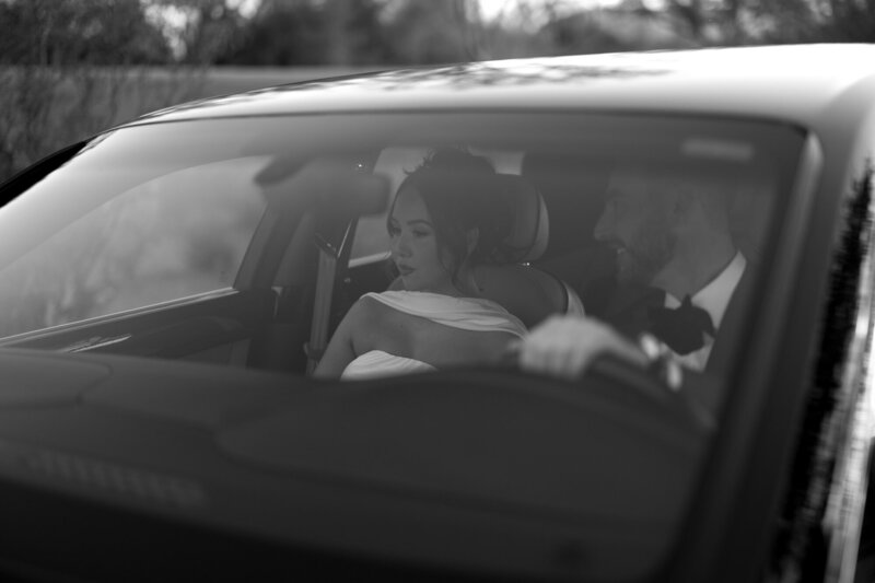 Engaged couple photographed in Rolls Royce by Scottsdale Wedding Photographer