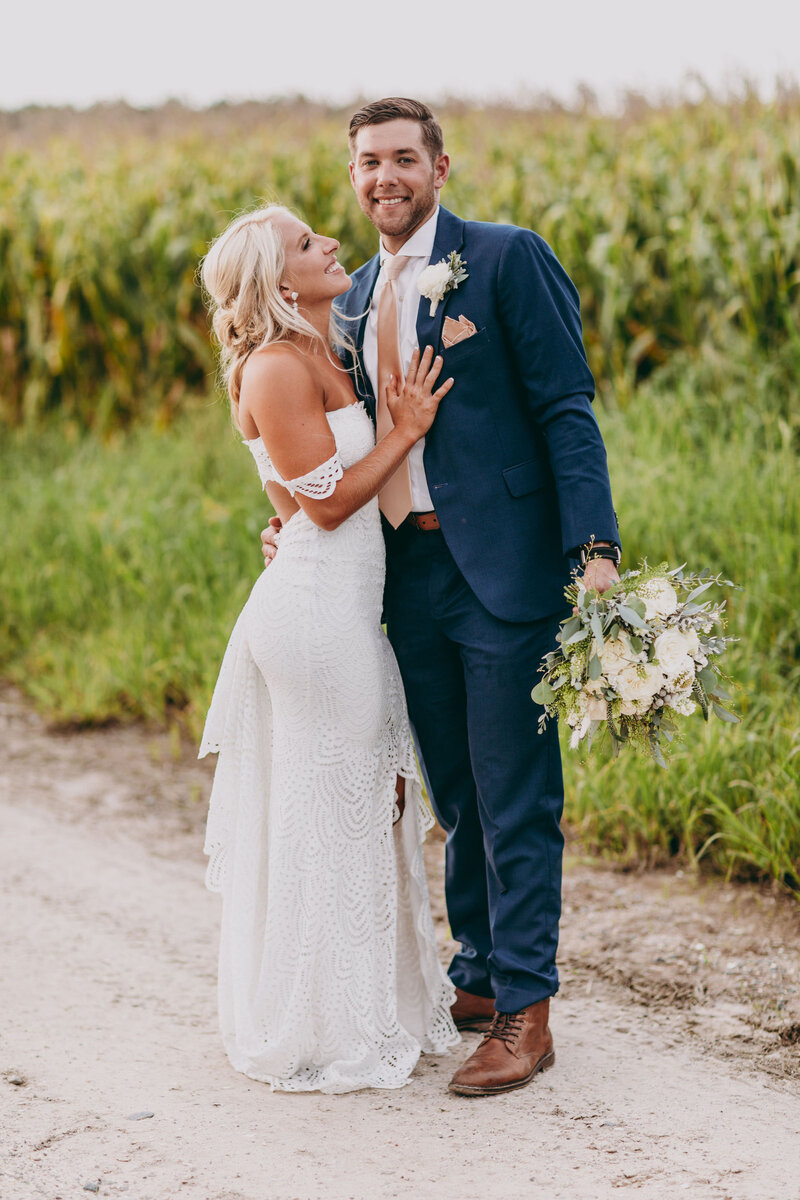 Bride and groom walk up memorial steps at their DC wedding