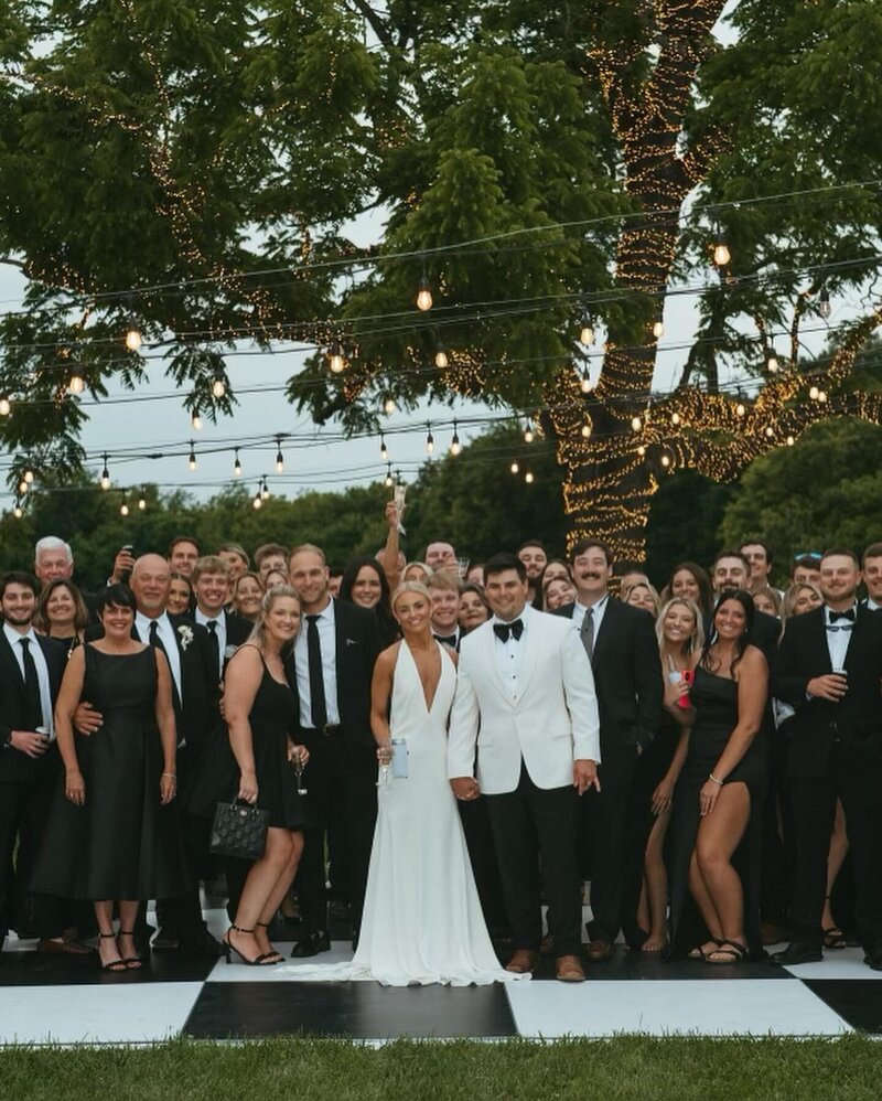 The River Place Wedding and Event Venue in Sevierville, TN | Elegant Outdoor Reception with Black and White Theme Dance Floor
