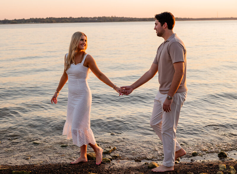 Couple walking at the lake