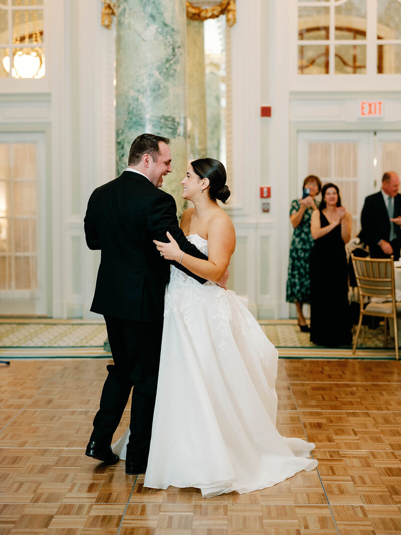 Bride and groom share first dance in the crystal room 