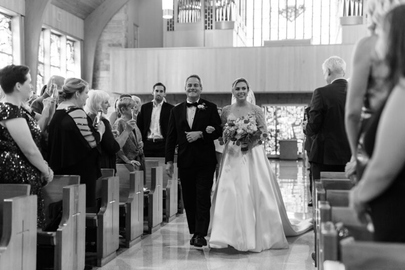 Bride and father walk down the aisle at St. Katherine of Sienna in Wayne PA