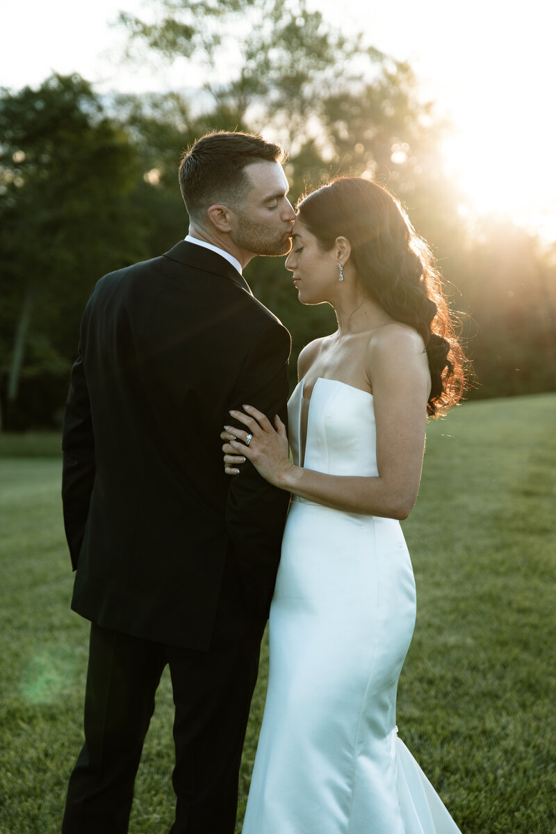 WEdding couples walking together laughing Morais Vineyard Virginia