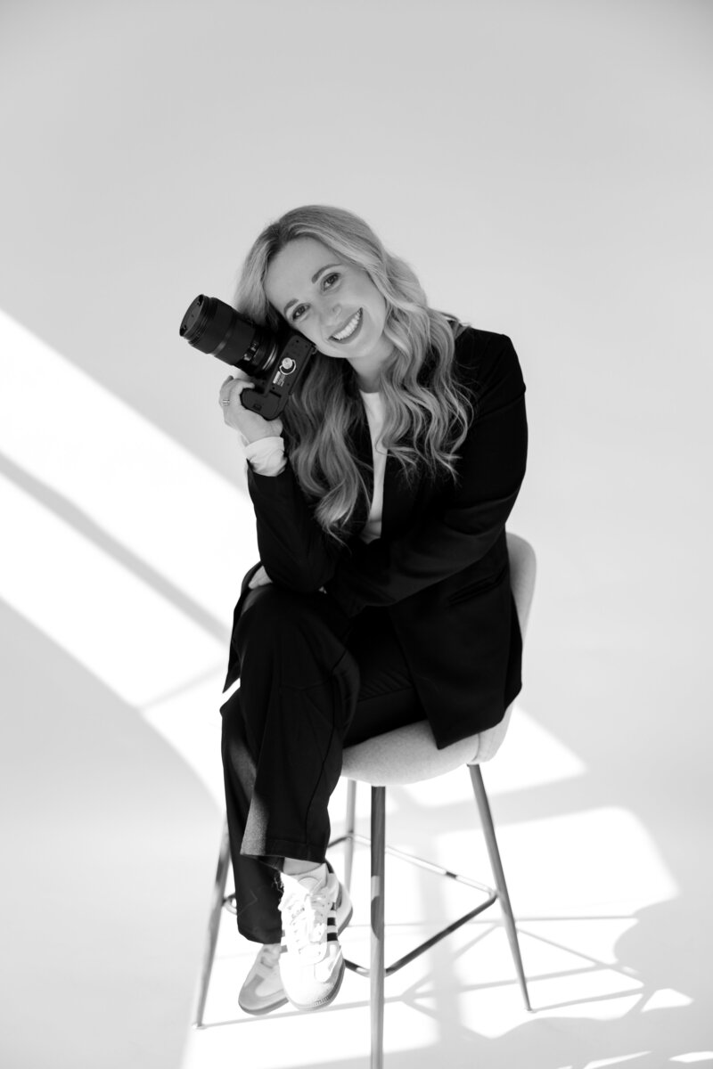 black and white photo of north carolina photographer in studio