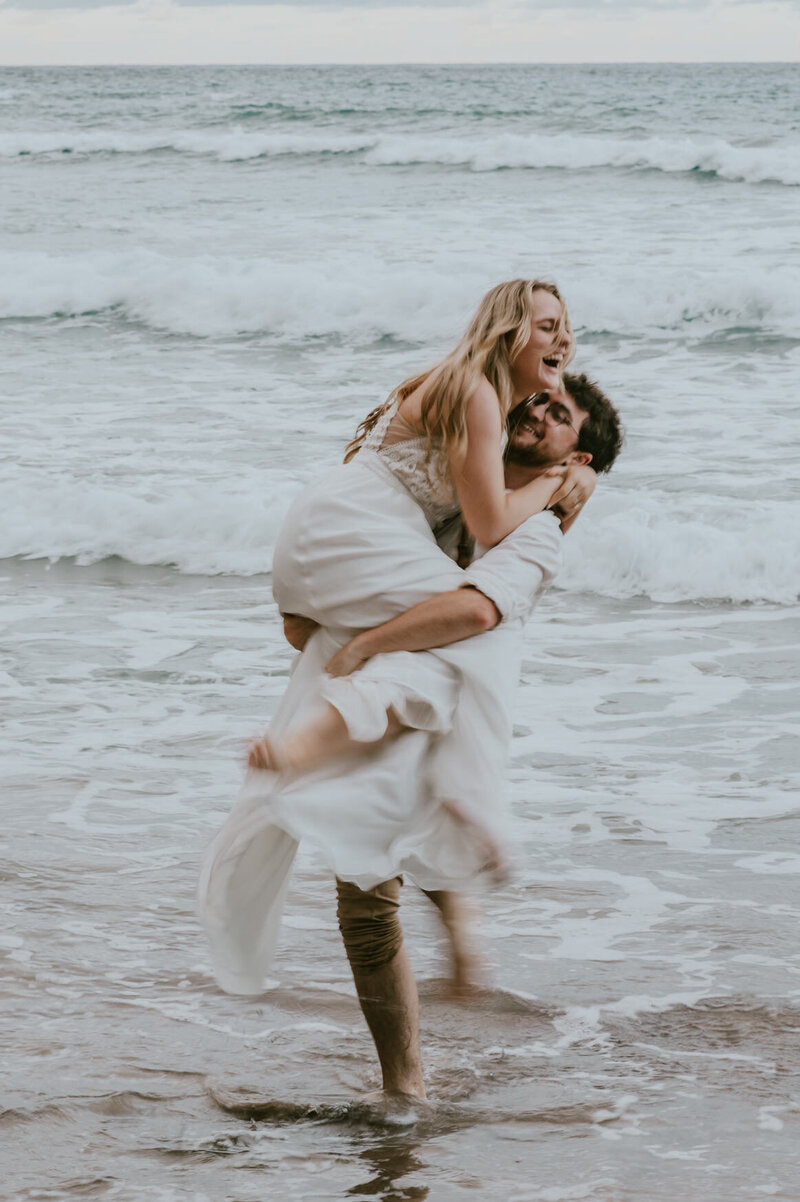 Big sur elopement photographer bride and groom on the beach