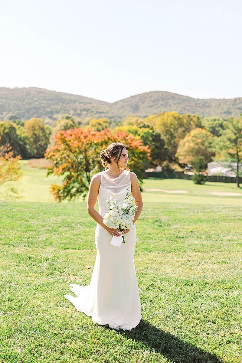 blacksburg-country-club-virginia-wedding-couple-posing-in-front-of-country-club
