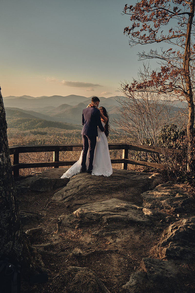 Hiking wedding couple shares a first dance with each other