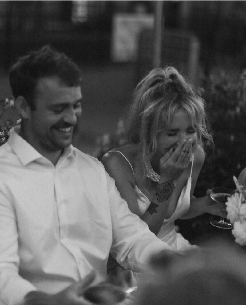 bride and groom laughing at reception at calamigos ranch