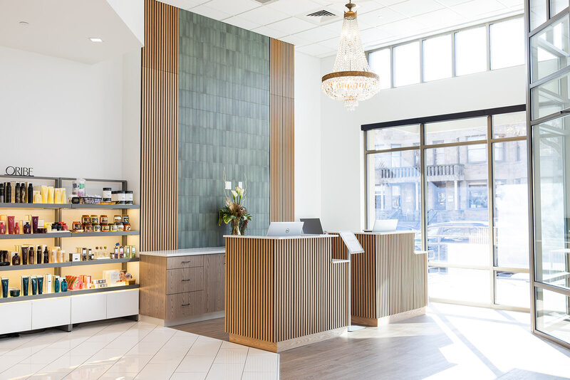 Interior view of Graeber & Company salon in Boise, showcasing modern design and comfortable seating.