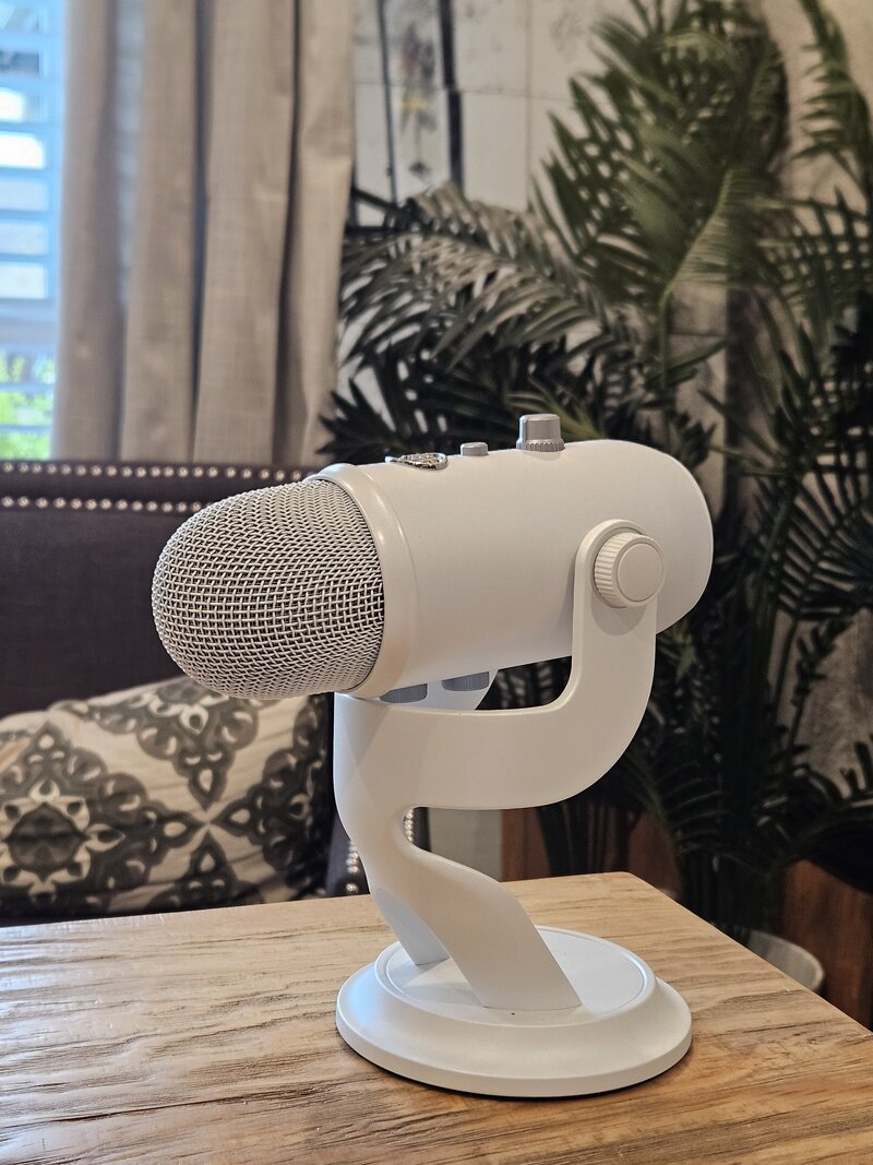 White podcast microphone for wellness talks