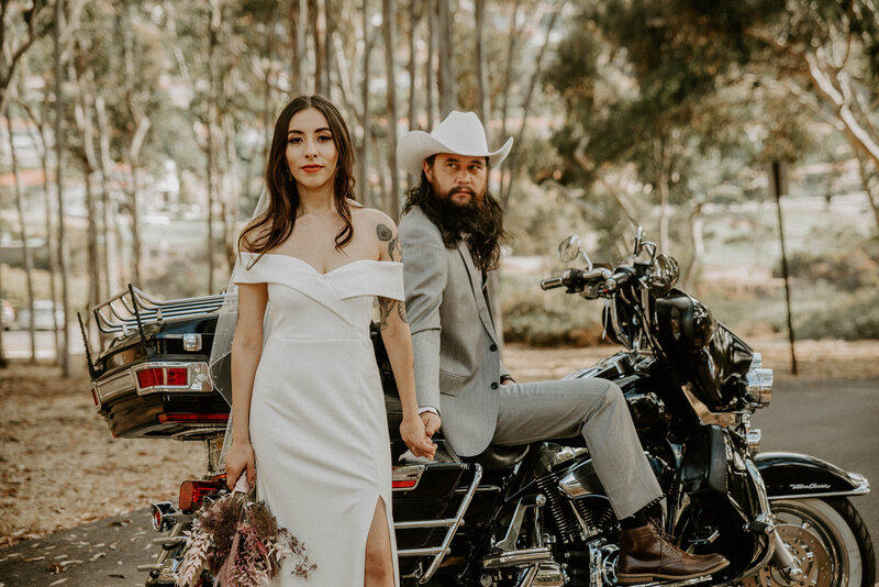 bride and groom with motorcycle