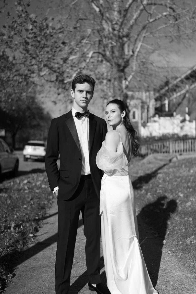Black-and-white portrait of a stylish couple in classic elegance