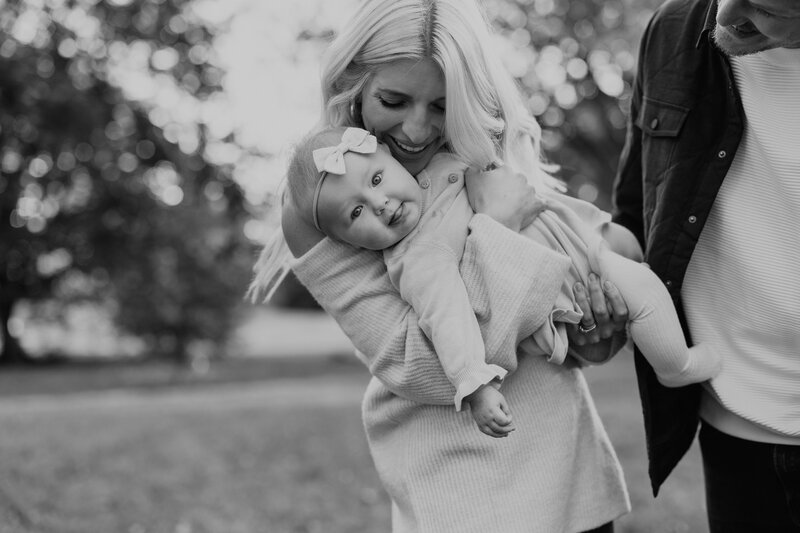 Black and white image of mother and infant daughter during mini session in St. Louis