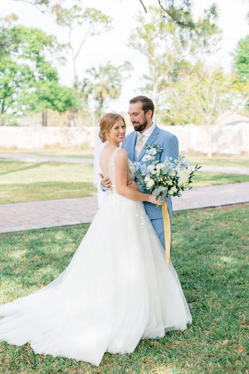 bride and groom portrait under oak trees
