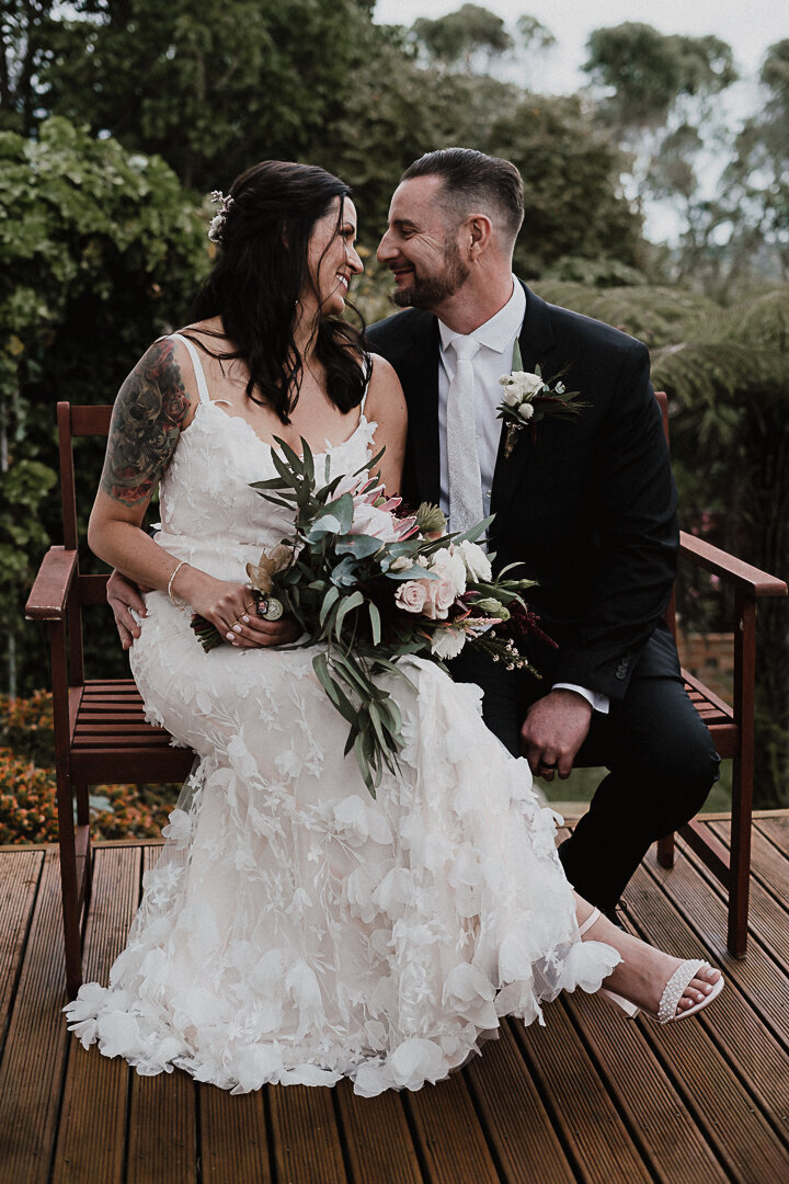 Backyard wedding in Auckland with boho and elegant style dress and suit