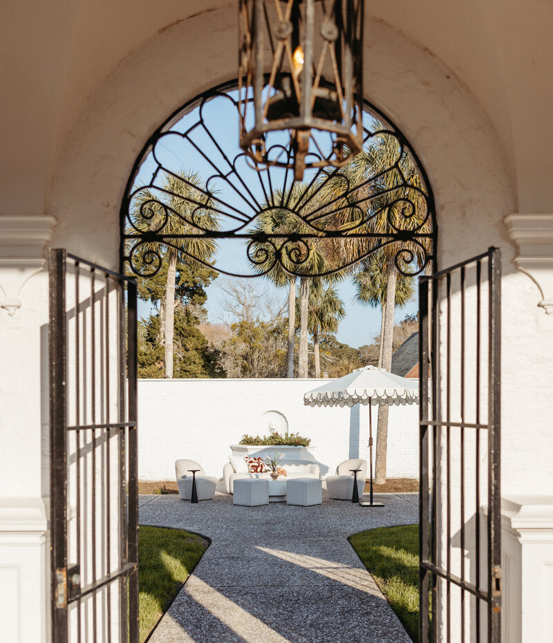Luxury wedding venue with grand entrance, columns, and reflecting pool