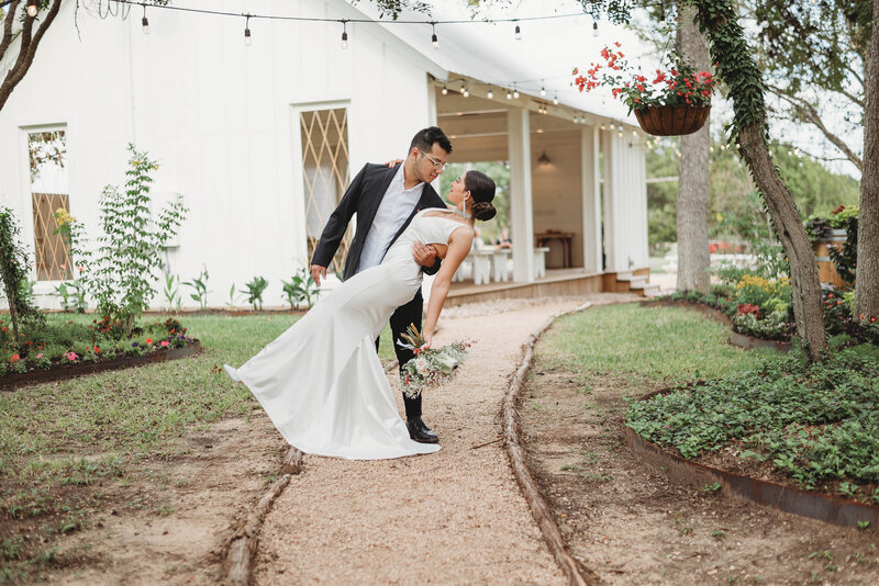 Bride and Groom dip kiss
