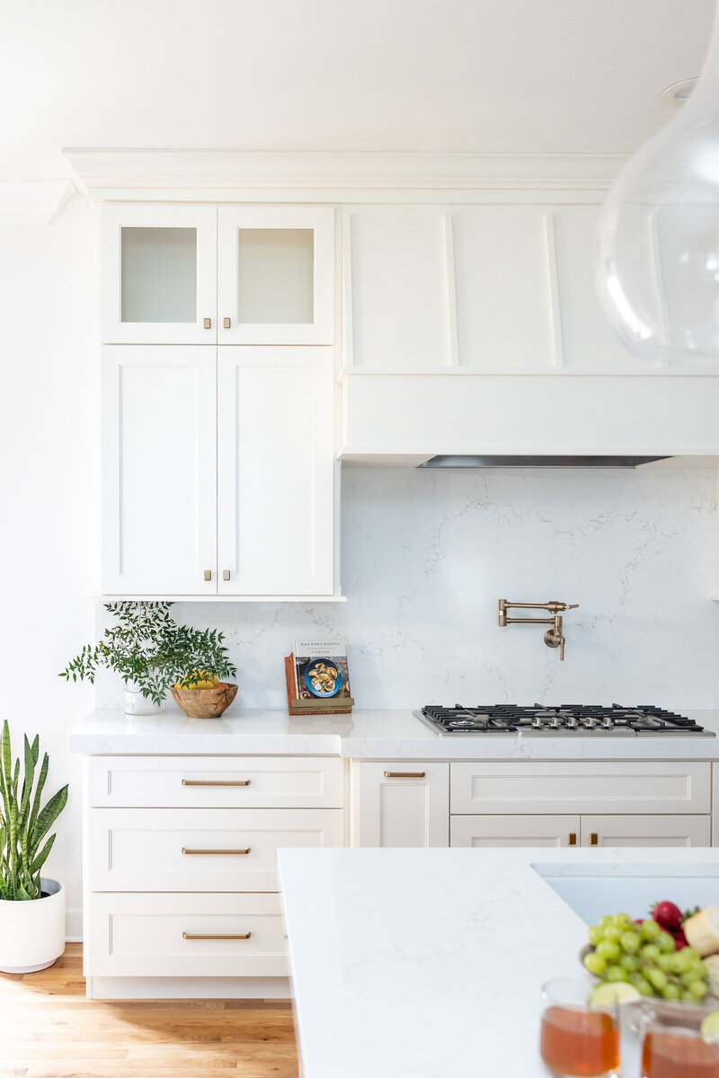 Custom cabinetry and quartz stone gives a modern take on a craftsman kitchen.  We incorporated hickory cabinetry for warmth.