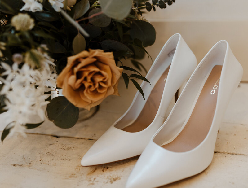wedding shoes and bouquet at Big Sur elopement