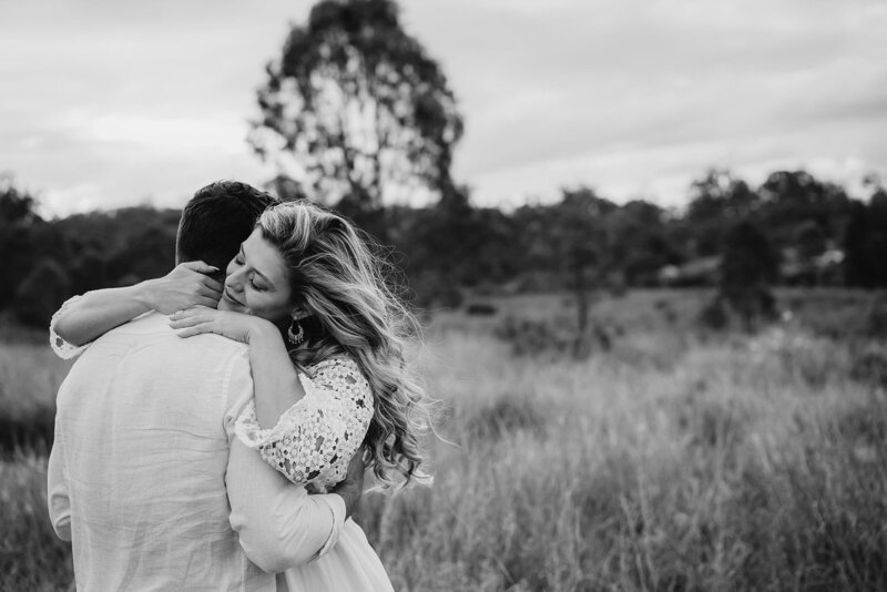 Couple embrace - Engagement in Brisbane