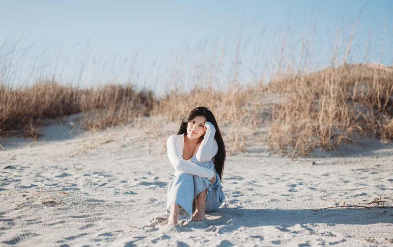 Adrianna-Cristina-Photorgaphy-Wedding Photographer sitting on Cherry Grove Beach in North Myrtle Beach, South Carolina.
