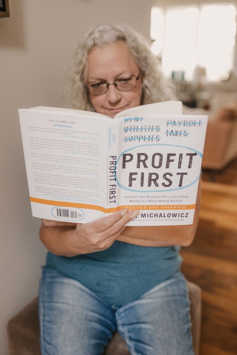 Michelle Krieger Dragonfly Ventures owner & Profit First Bookkeeper reading profit first