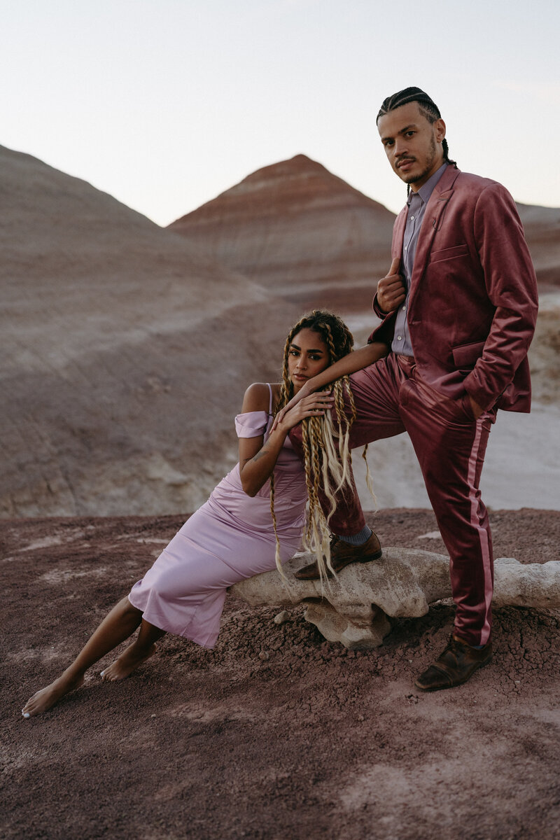 couple holding eachother in the desert