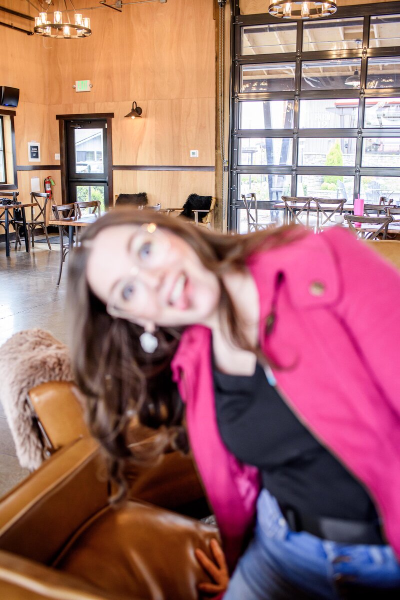 blurry photo of Lana being silly and sticking her tongue out at the camera