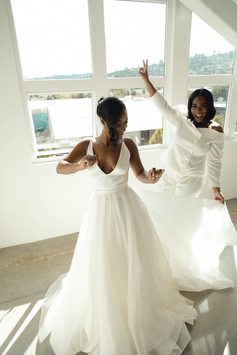 black women dressed in white dancing