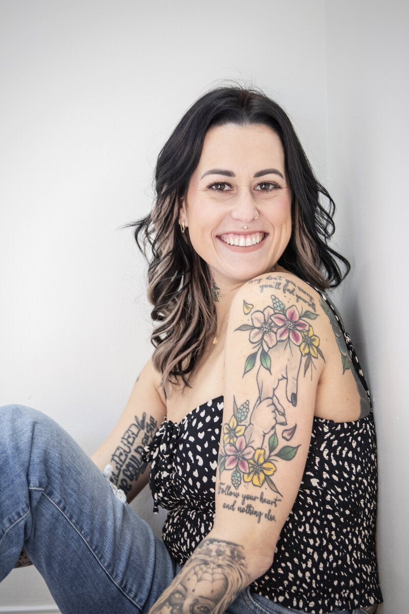 Photo of business owner Kat smiling.