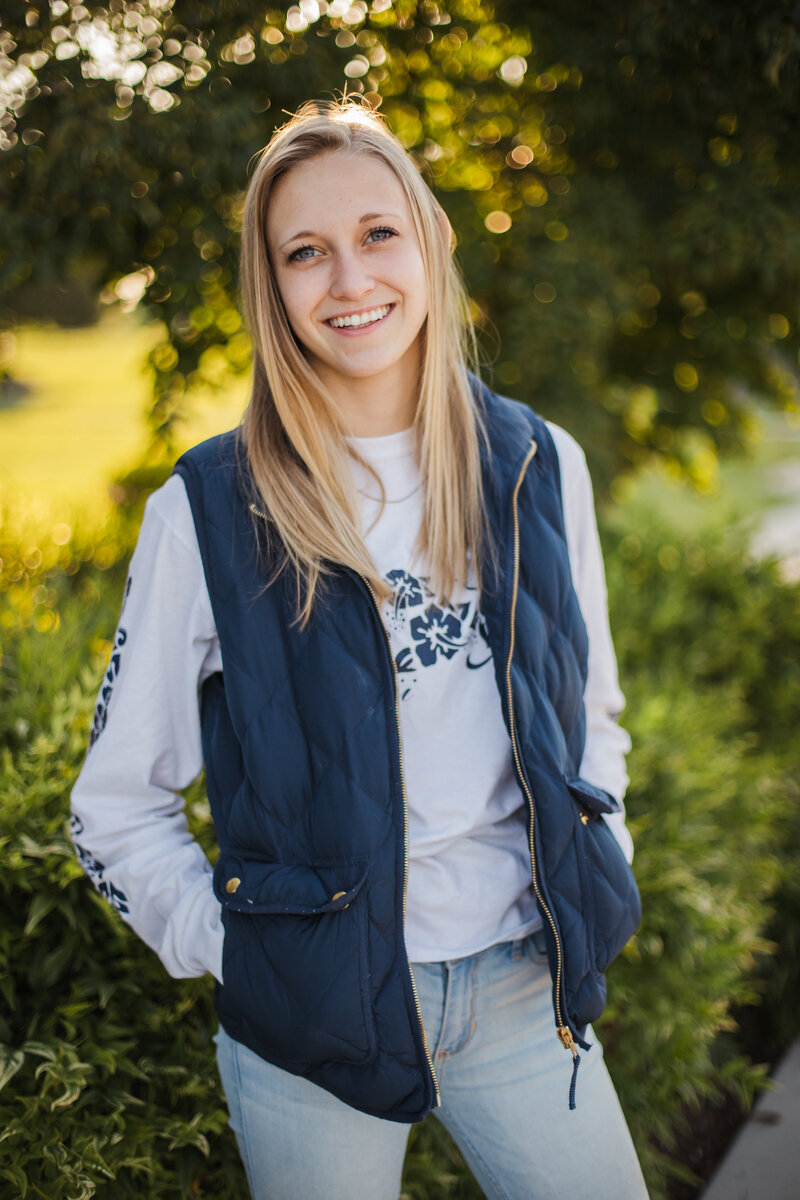 young Tennessee senior smiling during senior portraits