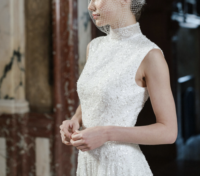 close up of beaded lace wedding dress