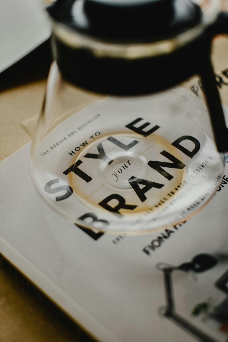 Style Your Brand book with glass on top