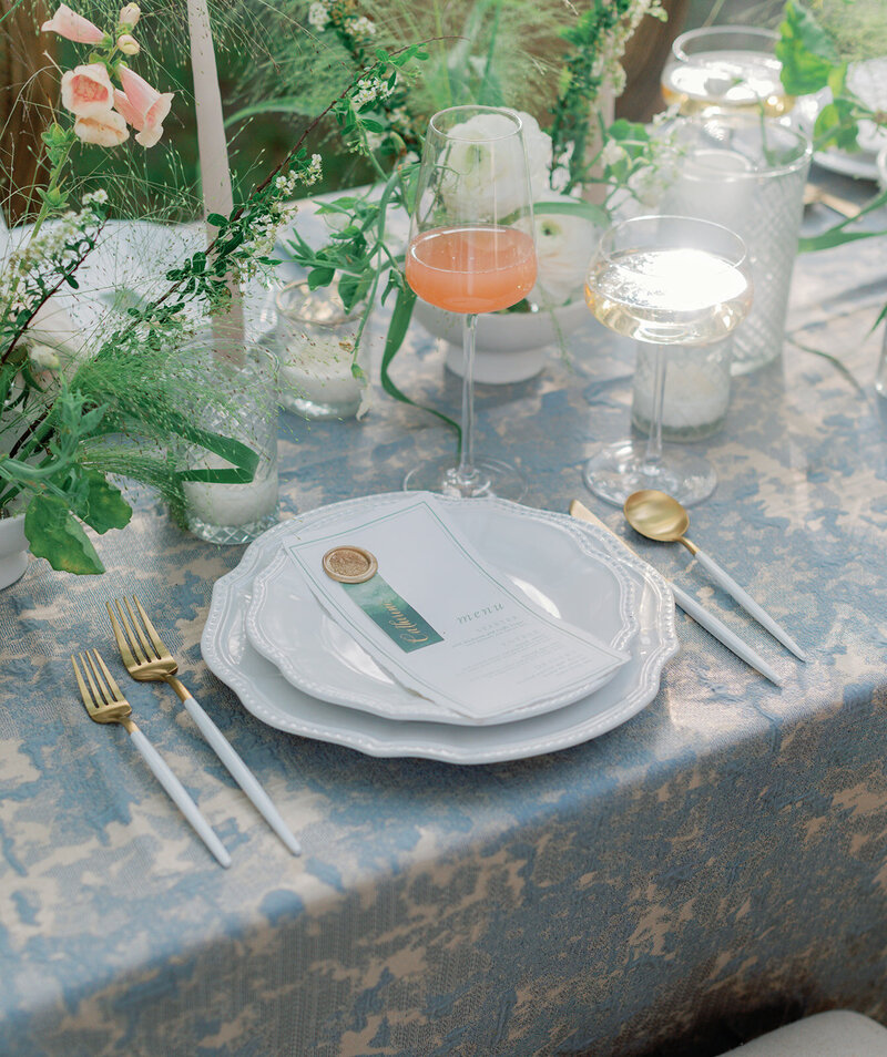 wedding bridal party walking in the mountain meadow at Devil's Thumb Ranch with Jenna Wren Photography