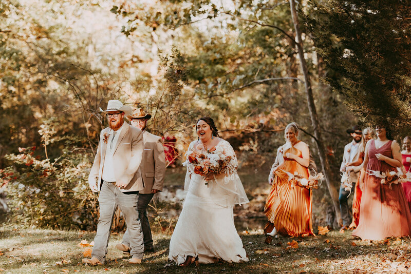 Bride by old wagon Toledo Area wedding venue Outdoor
