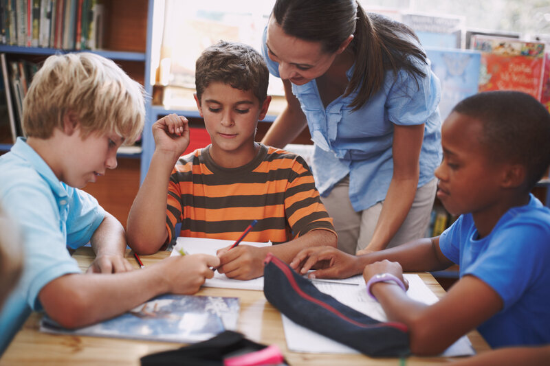A group of students working together at their table