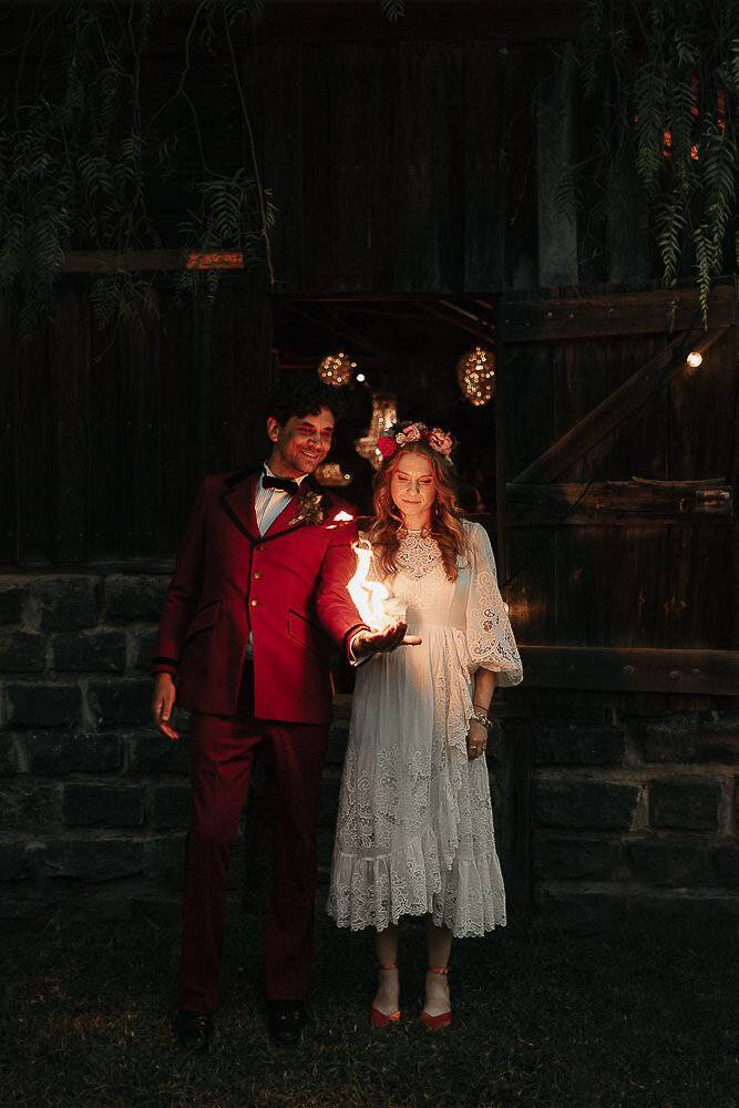 couple holding a fire ball at the collingwood childrens farm