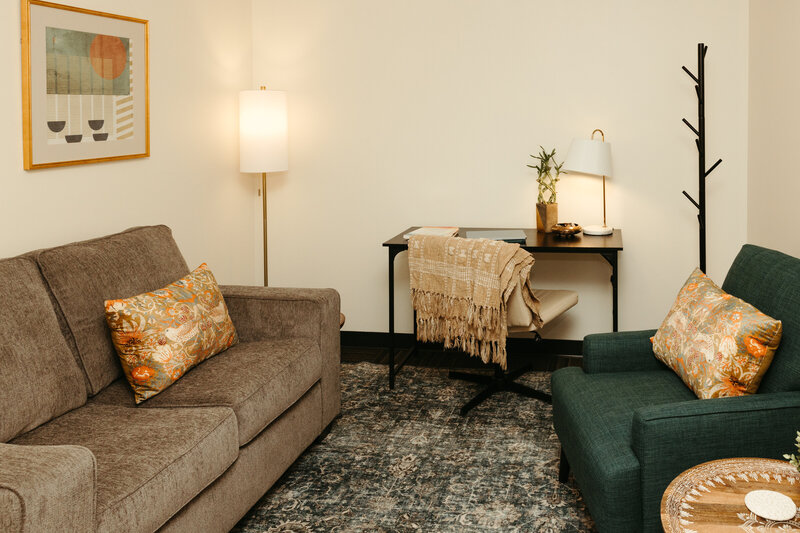 In-person therapy room set up for individual counseling.