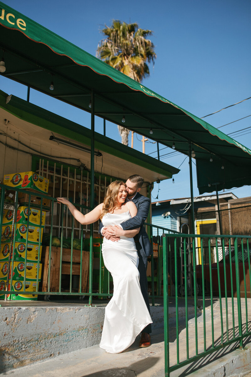Bride and Groom with blue and white wedding bouquet at the metal museum by memphis wedding photographer bethany reid visuals