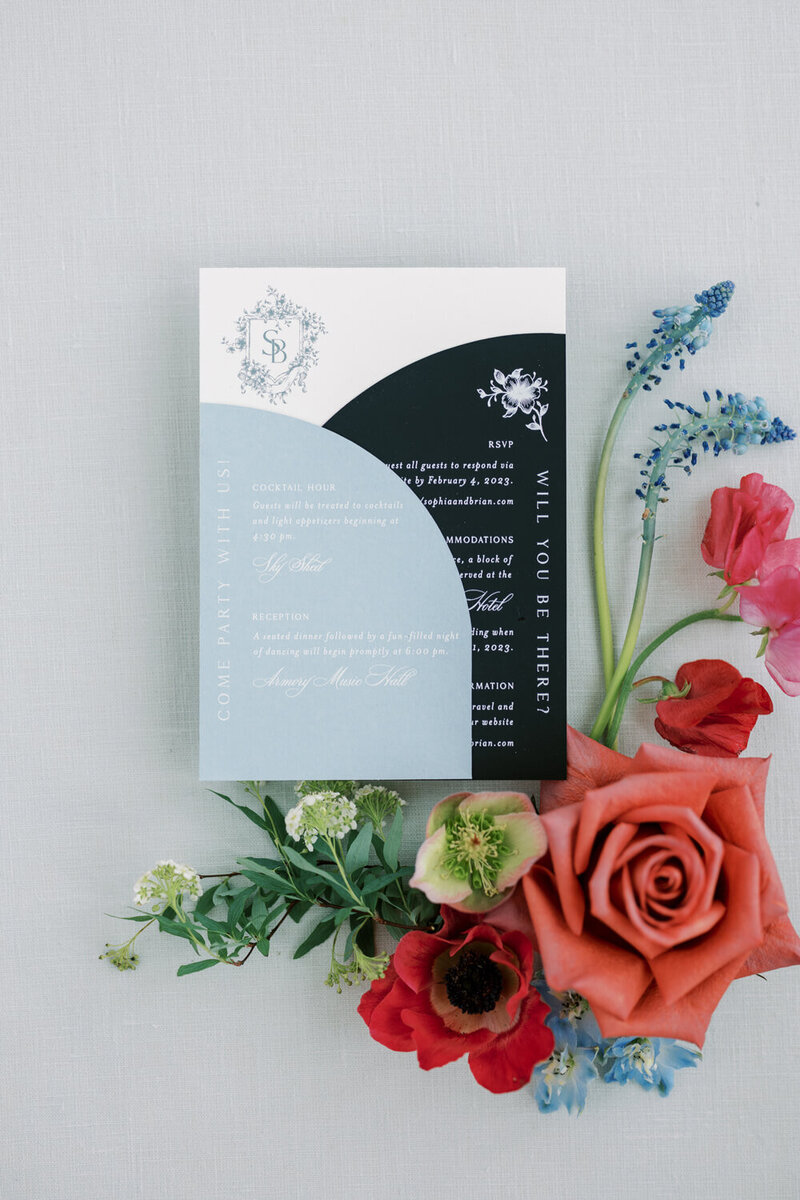 Custom modern black and blue luxury wedding invitation suite with curved cards for Armory Music Hall by Seventh and Anderson"