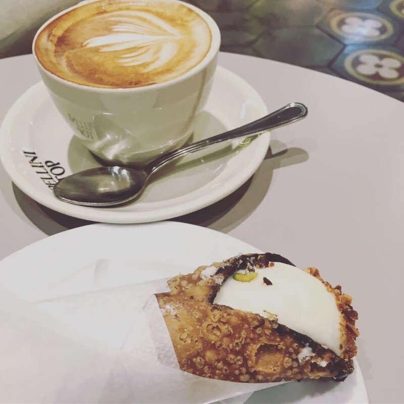 photo of a cannoli and cappacino