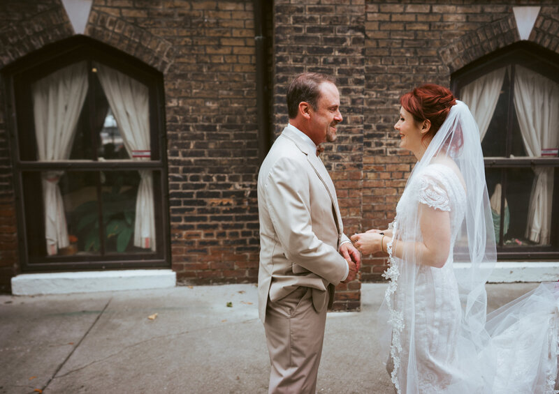 bride and father holding hands