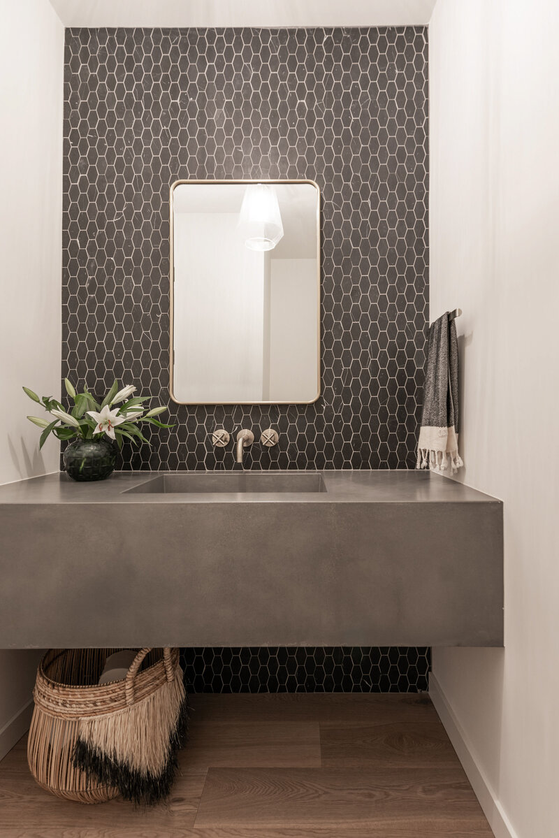 powder-room-floating-concrete-vanity-soapstone-tile