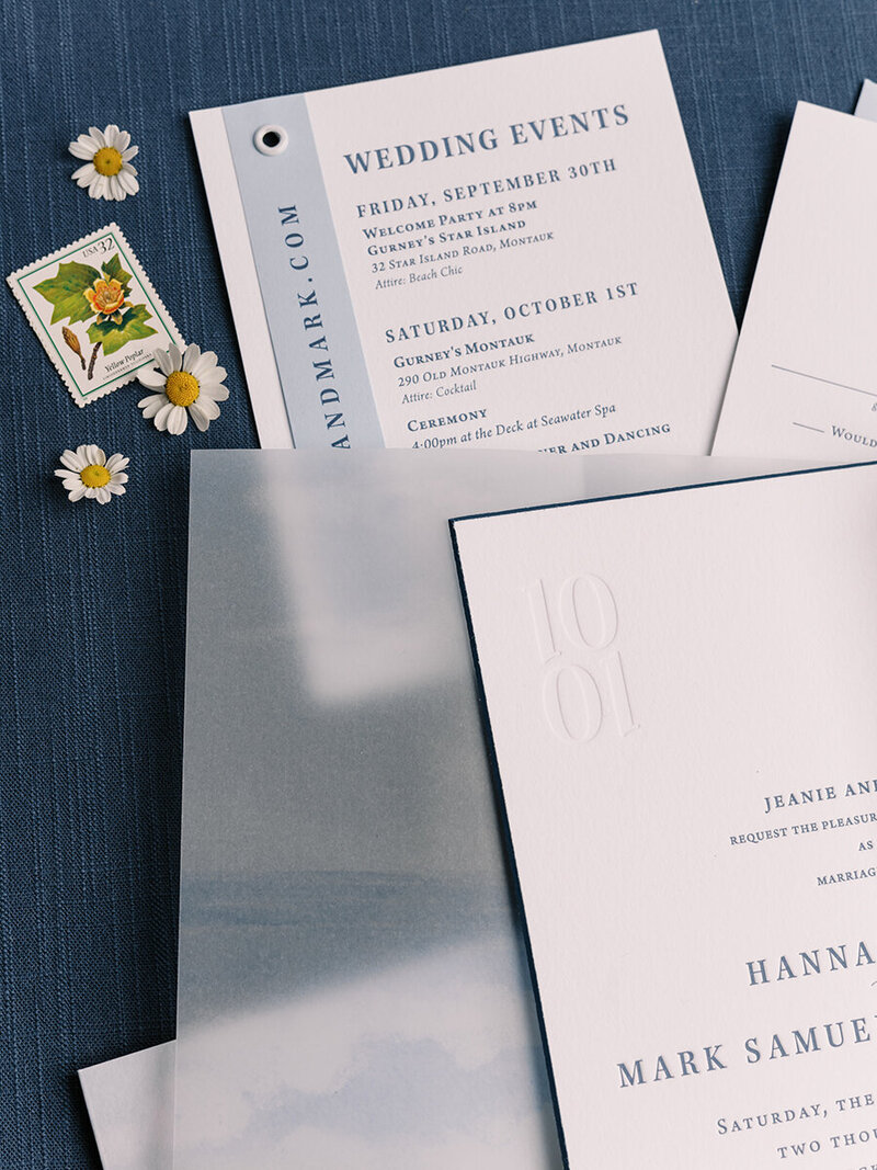 Blind press logo vellum wrap invitations