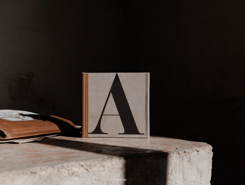 Elegant fashion portrait of Jasmina Kimova wearing minimalist sweater and wrap skirt, styled for masterclass in identity reinvention