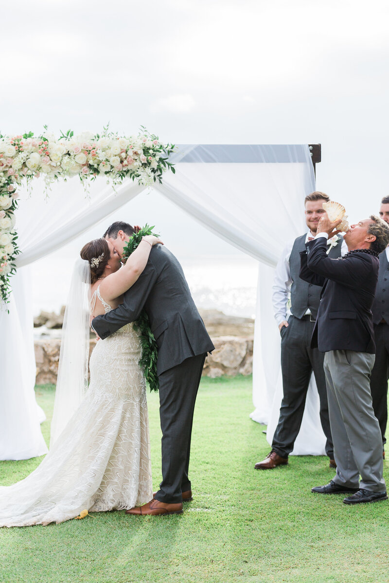 couple kissing after saying I Do at Disney Aulani wedding