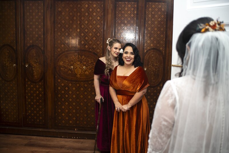 Modern wedding couple with heirloom photo album showing timeless value