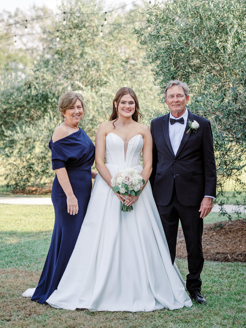 wedding formals portraits blue bride and groom bridesmaids groomsmen flower girl blue dress