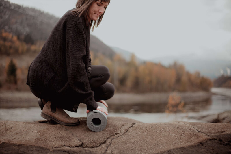 Mandy Chutskoff rolling up yoga mat