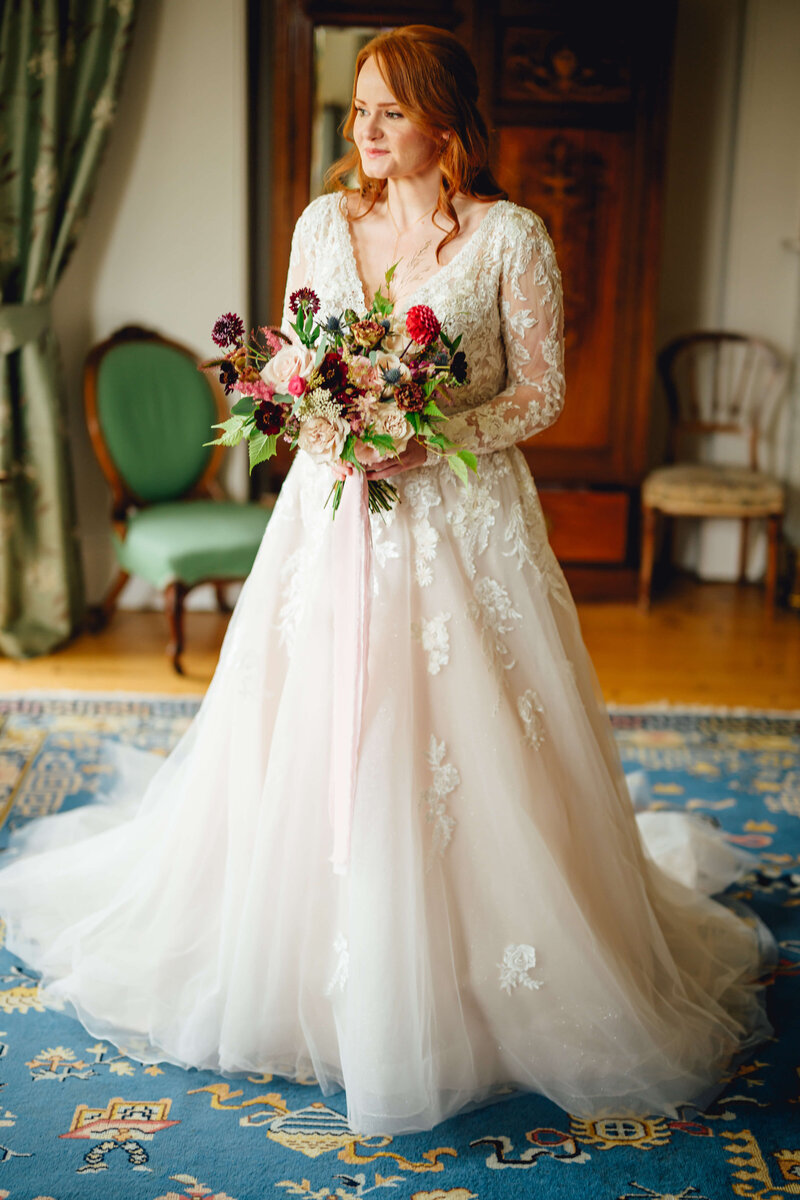 Bride in a lace ball gown at Homme House